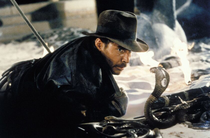 Indiana Jones (Harrison Ford) comes face-to-face with a cobra in “Raiders of the Lost Ark.” | LUCASFILM