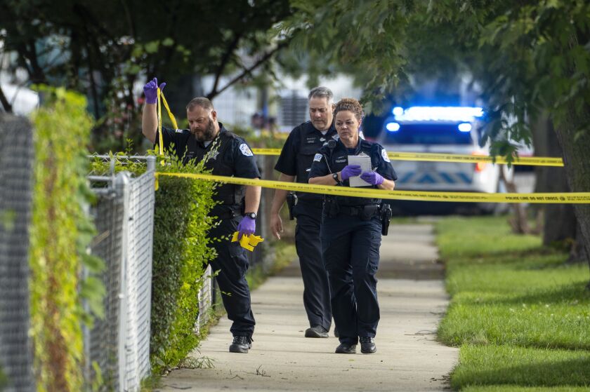 Chicago police work the scene of an officer involved shooting in the 7300 block of S. Hoyne Ave. in the Englewood neighborhood, Sept. 17, 2023.