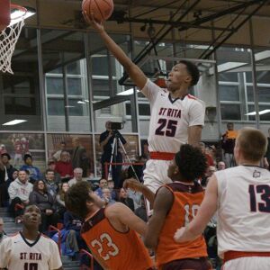 St. Rita’s Jeremiah Oden (25) floats to the basket against Bro. Rice Tuesday 12-04-18 Robinson/For Sun-Times