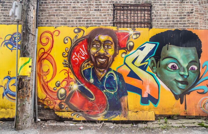 A portion of Paul Branton’s mural in the 300 block of East 47th Street.