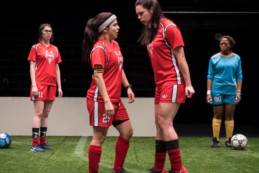 Sarah Price (No. 11), Isa Arciniegas (No. 25), Natalie Joyce (No. 7) and Angela Alise (No. 00) in a scene from”The Wolves” by Sarah DeLappe, directed by Vanessa Stalling at Goodman Theatre. | Liz Lauren
