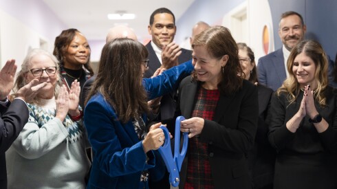 Dana Weiner, who is chief officer for Children’s Behavioral Health Transformation in the Office of Governor J.B. Pritzker, cuts the ribbon with Heidi E. Mueller, who is director of the Illinois Department of Children and Family Services, at the expanded inpatient psychiatric unit for youth with autism and intellectual and developmental disabilities at Ann & Robert H. Lurie Children’s Hospital of Chicago.