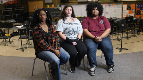 Evanston Township High School marching band members (from left): Ifeoluwa Dada, 16, a junior, Adri Lieberman, 17, a senior, and Kaleem Alam, 16, a junior, photographed in the band room at the high school on Monday, October 19, 2026.