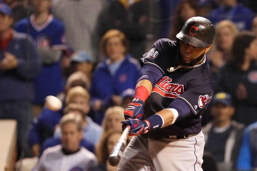 <em>Carlos Santana connects on a 3-2 fastball for a home run. (Getty Images)</em>