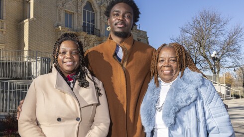 Tosheika Thomas, her son Daevon Reynolds, and grandmother Linda Thomas in front of the Garfield Park Fieldhouse.