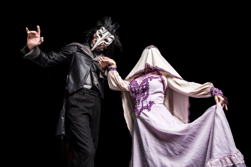 Ryan Lanning and Megan DeLay in Black Button Eyes Productions’ “Nevermore – The Imaginary Life and Mysterious Death of Edgar Allan Poe.” | Cole Simon