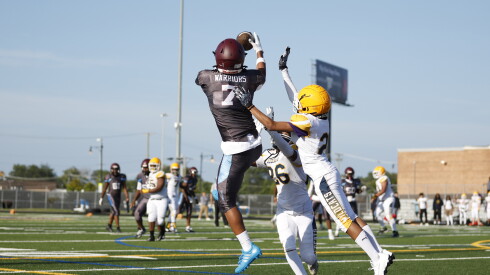 Perspectives’ Kobe Hamlet (7) catches a pass for a touchdown against Rauner.