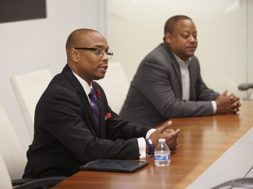 From left, 6th Ward aldermanic candidate Richard A. Wooten and Ald. Roderick T. Sawyer meet with the Sun-Times Editorial Board in January. File Photo. | Rich Hein/Sun-Times