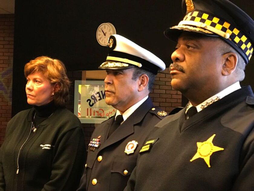 Alicia Tate-Nadeau, executive director of the city’s Office of Emergency Management and Communication, Fire Cmsr. Jose Santiago and Police Supt. Eddie Johnson announce plans to beef up training to deal with mental health emergencies. | Fran Spielman/Sun-T