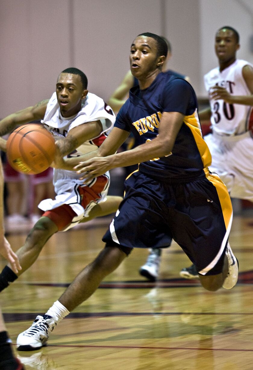 Neuqua Valley’s Jabari Sandifer passes the ball during their game against East Aurora in 2011.