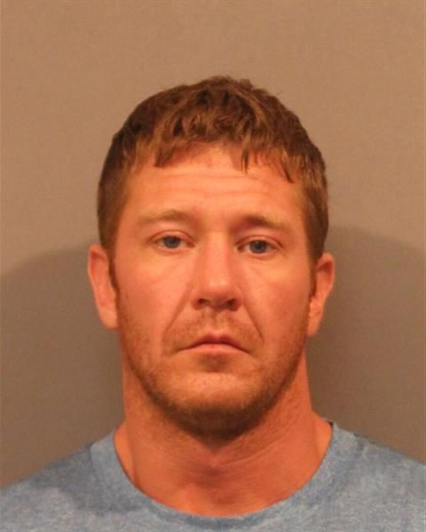 Eric Hummel was charged with killing his 9-year-old daughter while telling his sons the gun “can kill.” | Hobart Police photo