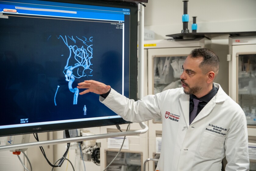 Dr. Tareq Kass-Hout explains the process of removing a blood clot. He was speaking at a look behind the scenes at the UChicago Medicine Center for Care and Discovery in Hyde Park on Wednesday, May 6, 2026.