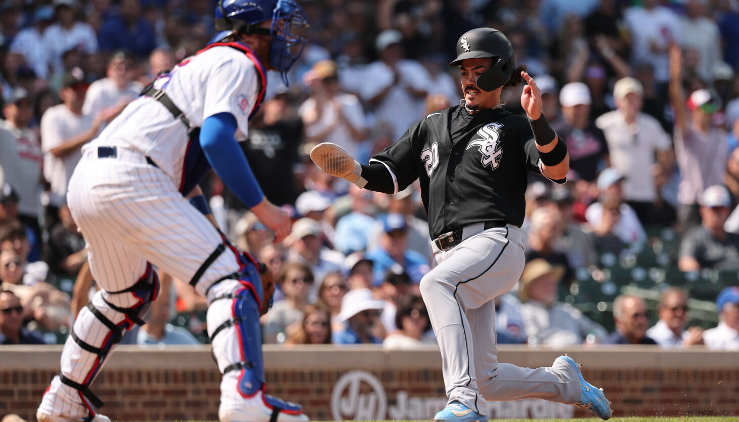 Cubs! White Sox! Playoffs! Keep chanting those words and maybe, just maybe, it'll last more than a few days