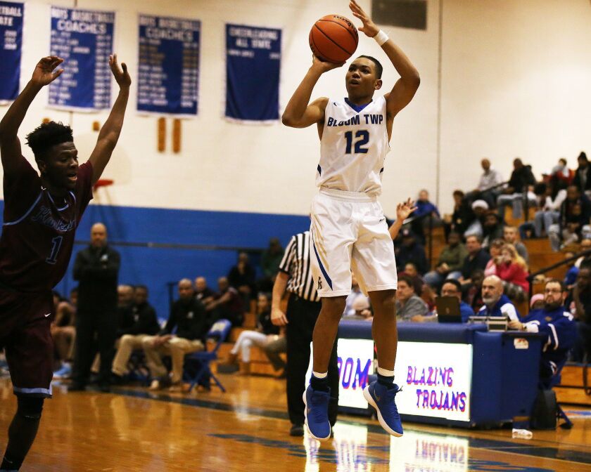 Bloom’s Dante Maddox, Jr., hits from three. He committed to Cal State-Fullerton on Friday.