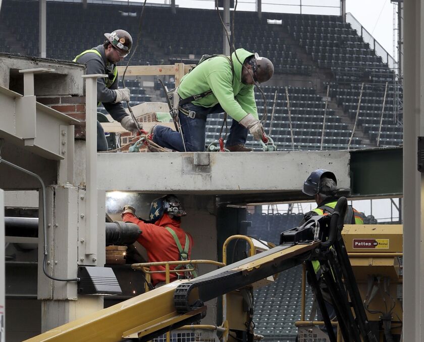 Construction in the right-field corner of Wrigley Field continued ahead of Monday’s opener at Wrigley Field. | AP