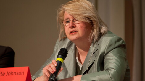 Annette Johnson speaks as candidates running for District 131 school board square off during a forum at First Presbyterian Church on Aurora's east side on Tuesday, April 2, 2013.