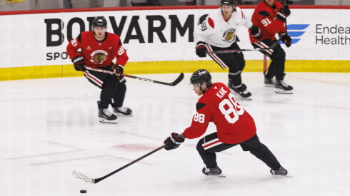 Patrick Kane, Frank Nazar and Roman Kantserov at Blackhawks training camp Thursday.