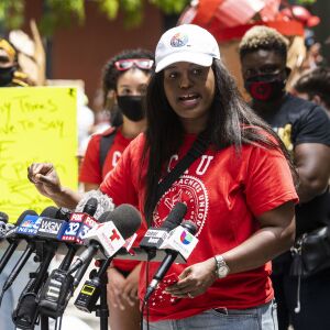 Stacy Davis Gates, vice president of the Chicago Teachers Union, speaks during a rally in Federal Plaza in the Loop to call for the Chicago Board of Education to vote to end a $33 million contract between Chicago Public Schools and the Chicago Police Department, Wednesday afternoon, June 24, 2020.