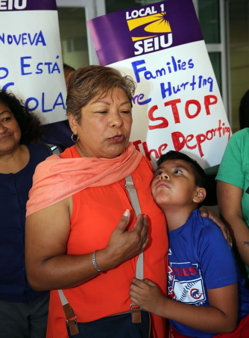 Genoveva Ramirez hugs her grandson, Mariano Castellanos, after her hearing at the U.S. Immigration and Customs Enforcement office on Thursday, Sept. 28, 2017. | Kevin Tanaka/For the Sun Times