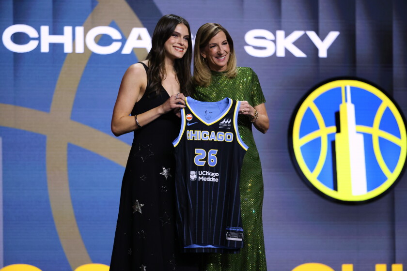 UCLA guard Gabriela Jaquez poses with WNBA commissioner Cathy Engelbert after being selected fifth overall by the Sky in the first round of the WNBA Draft on Monday, April 13, 2026, in New York.