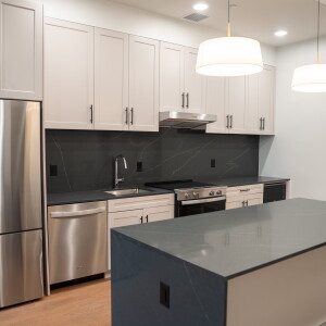 The kitchen inside a one-bedroom unit at the Bellwether Residences in the Loop.
