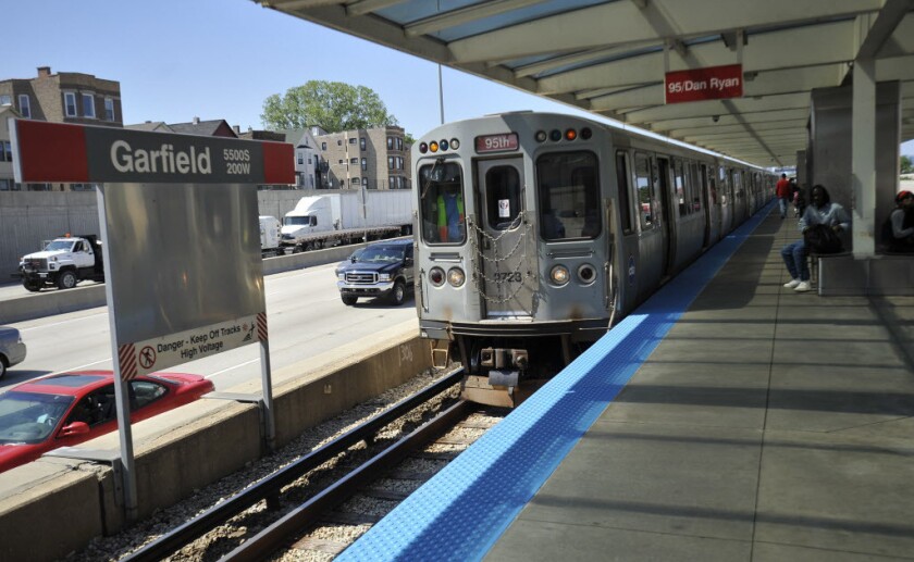 A Red Line train pulls into the Garfield Station. State lawmakers are wrestling with how to solve Chicago