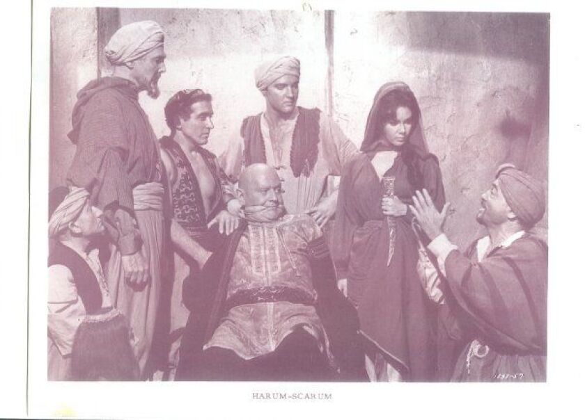 Jack Costanzo (left of Elvis Presley) appeared in the film “Harum Scarum.” | Provided photo