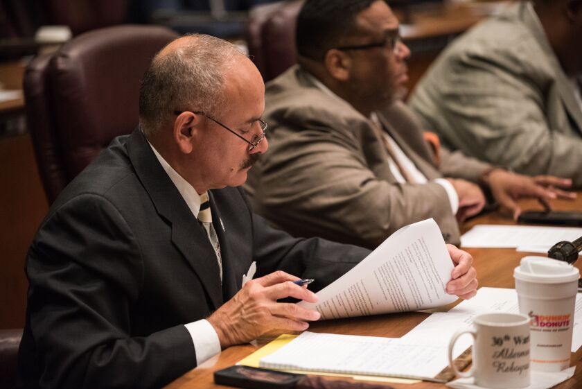 Ald. Ariel Reboyras (30th) follows along with Mayor Rahm Emanuel’s annual budget address Wednesday. | Max Herman/For the Sun-Times