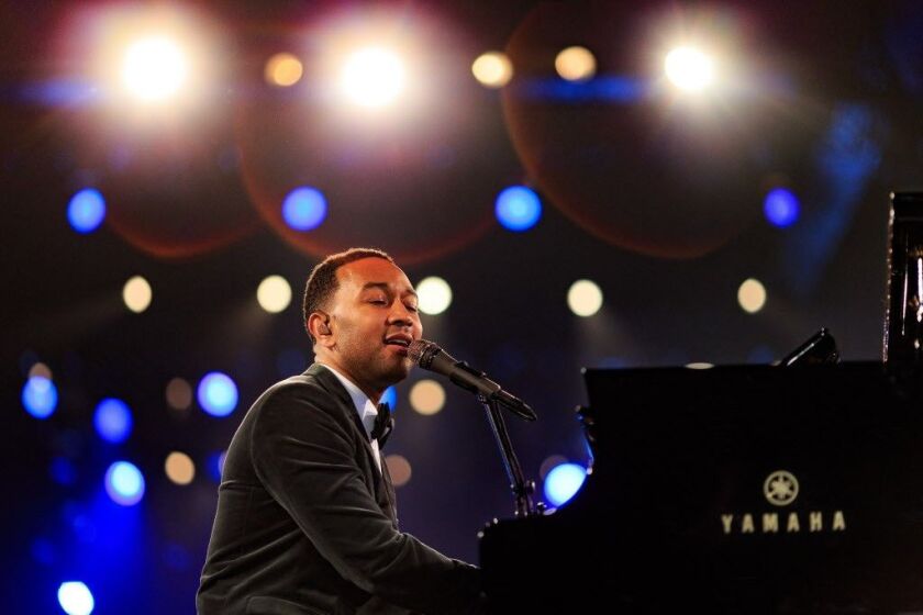 Singer John Legend performs onstage during the 2016 MusiCares Person of the Year honoring Lionel Richie on February 13, 2016 in Los Angeles, California. | Photo by Christopher Polk/Getty Images for NARAS