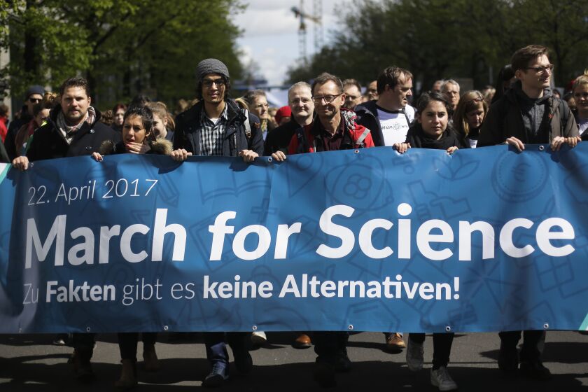 Thousands of demonstrators attend the March for Science in Berlin on Saturday. | Markus Schreiber/Associated Press