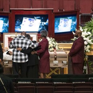 Mourners pay their final respects at the wake for Jemel Roberson, Saturday, Nov. 24, 2018, in Chicago. Roberson was shot and killed by Midlothian police on Nov. 11. | Tyler LaRiviere/Sun-Times