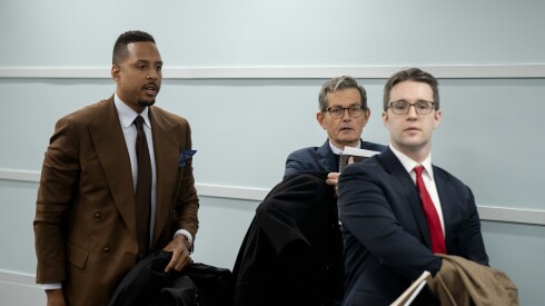 John Gleeson, center, walks with Justin A. Moore, left, attorney for Larry Hoover, after a clemency hearing Tuesday.