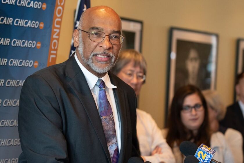 Gregory Abdullah Mitchell, executive director of The Council of Islamic Organizations of Greater Chicago, speaks at a press conference following the Supreme Court’s decision on upholding the travel ban. | Colin Boyle/Sun-Times