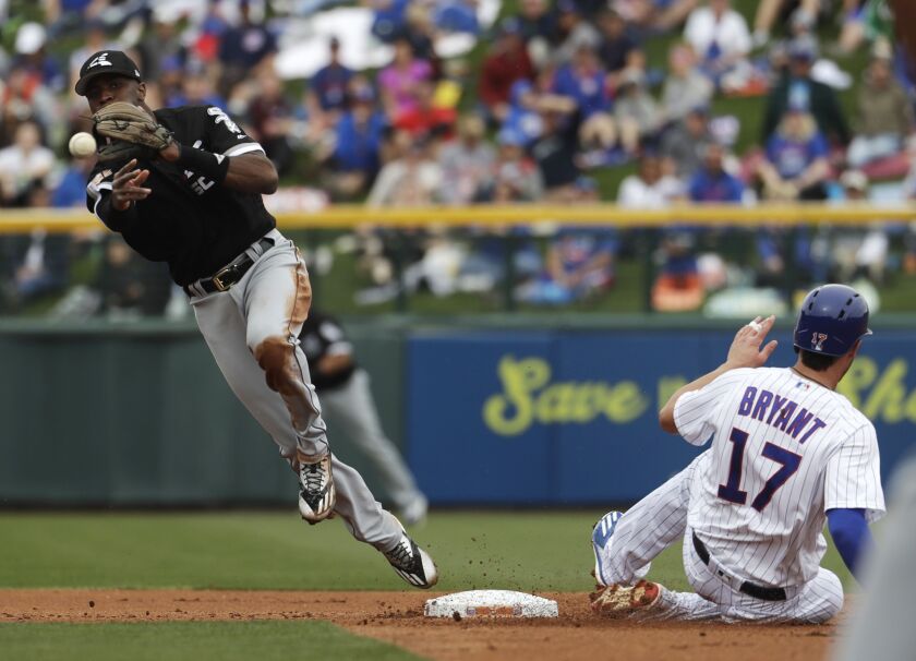 The Cubs’ Kris Bryant is out at second as the Sox’ Tim Anderson turns a double play on a ball hit by Anthony Rizzo.