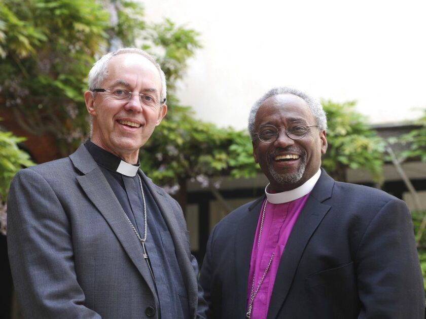 The Archbishop of Canterbury Justin Welby, left, and American bishop Michael Curry pose for the media ahead of the wedding of Prince Harry and Meghan Markle on Saturday at St George’s Chapel, Windsor, England, Friday, May 18, 2018. Curry is known as an en
