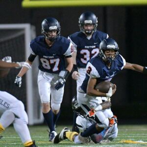 Payton’s Damien Goodman (3) gets tripped up. Worsom Robinson/For the Sun-Times.