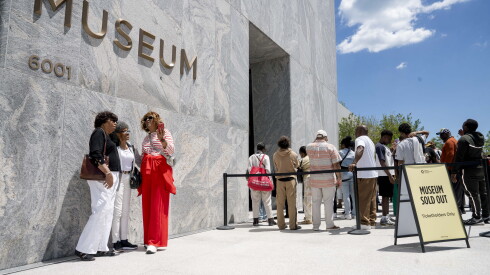 People line up at the Obama Presidential Center Museum on the South Side, which opened to public on Friday.