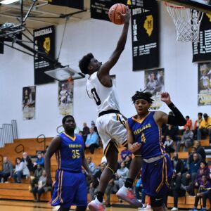 Marian Catholic’s Joe Green gets a fast break. Worsom Robinson/For the Sun-Times.