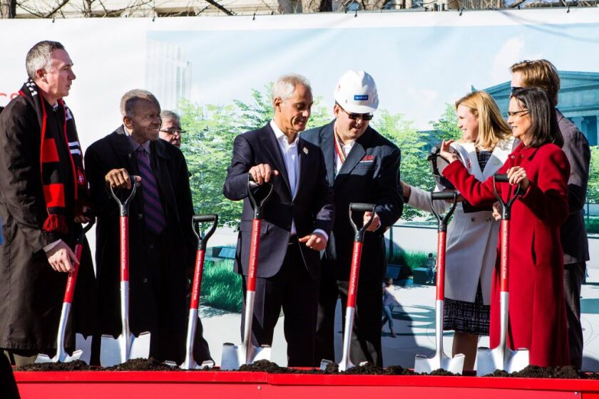 Chicago Parks District Superintendent Michael P. Kelly (from left), artist Richard Hunt, Mayor Rahm Emanuel, Special Olympian Eric Baumann and Illinois Attorney General Lisa Madigan participate in the official groundbreaking ceremony at Soldier Field on F
