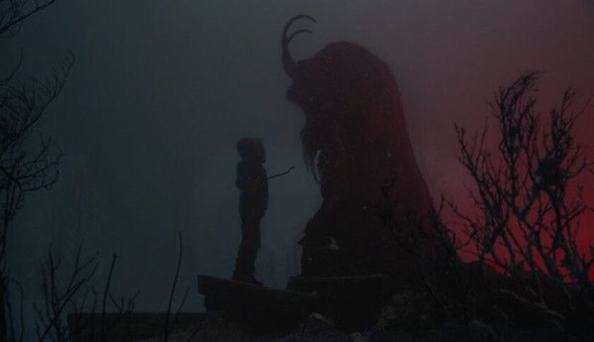 Max (Emjay Anthony) comes face to face with a yuletide deity in “Krampus.” | UNIVERSAL