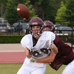 Loyola’s Matt Mangan keeps his eyes on the ball during a practice.