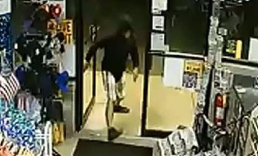 Surveillance image of the suspect in a convenience store burglary Sept. 15 in Naperville. | Naperville police