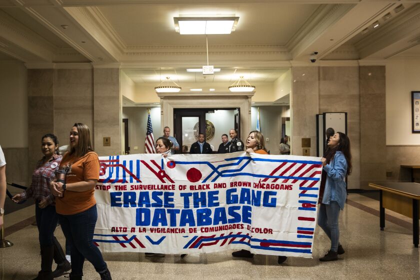 Protesters descended on City Hall Thursday to decry the Chicago Police Department’s use of a gang database and demand its removal. CPD said its Criminal Enterprise Information System, launching in the next six to 12 months and is is intended to ultimately replace the department’s existing gang database, which has been criticized as ineffective, inaccurate and outdated.