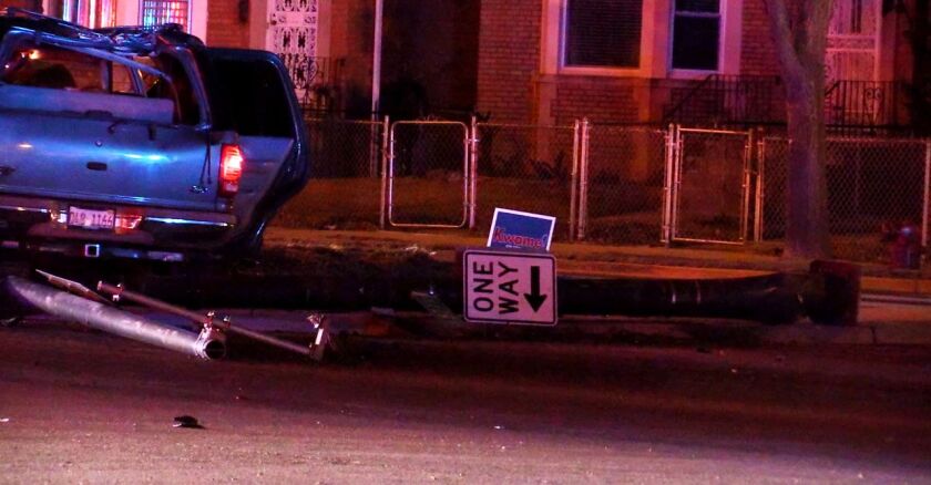 An SUV struck a pole after the driver was wounded in a shooting early Sunday in the 500 block of West 87th Street. | Justin Jackson/Sun-Times