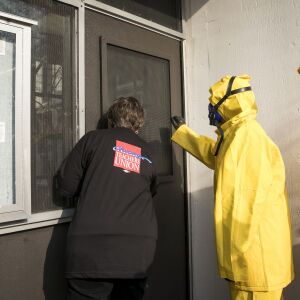 CTU members in hazmat suits offer to conduct an independent inspection for health and safety hazards. | Ashlee Rezin/Sun-Times