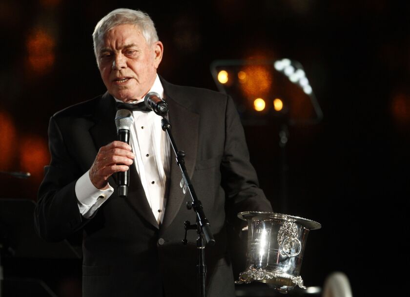 In this Tuesday Oct. 30, 2012 file photo, Tom T. Hall accepts the Icon Award at the 60th Annual BMI Country Awards in Nashville, Tennessee.