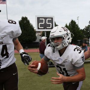 Mount Carmel’s Kieran Conjar (31) celebrates his touchdown. Allen Cunningham/For the Sun-Times.