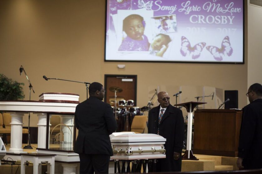 Semaj Crosby’s tiny casket is ushered in for the toddler’s funeral earlier this month at Prayer Tower Ministries in Joliet. | Maria Cardona / Sun-Times