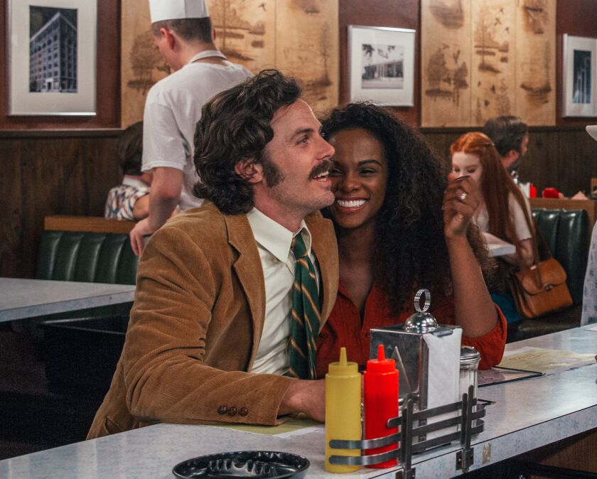 Police Detective John Hunt (Casey Affleck, left, with Tika Sumpter) is on Tucker’s trail in “The Old Man & the Gun.” | Fox Searchlight