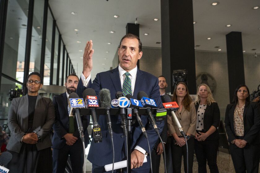 U.S. Attorney John Lausch speaks to reporters after R. Kelly was convicted on six of 13 counts in his indictment, including counts alleging he recorded his sexual abuse of a 14-year-old girl in the late 1990s, Wednesday, Sept. 14.